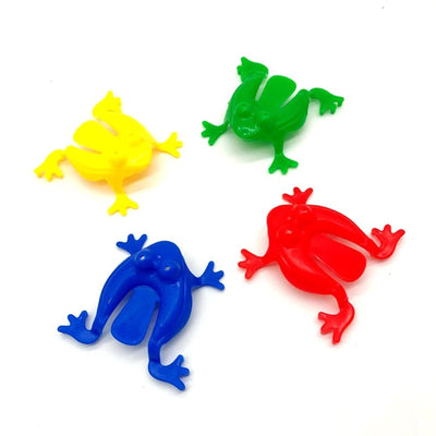 Jouets de grenouilles sautant