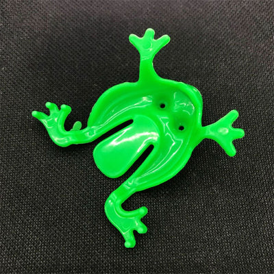 Jouets de grenouilles sautant