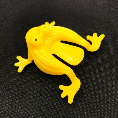 Jouets de grenouilles sautant
